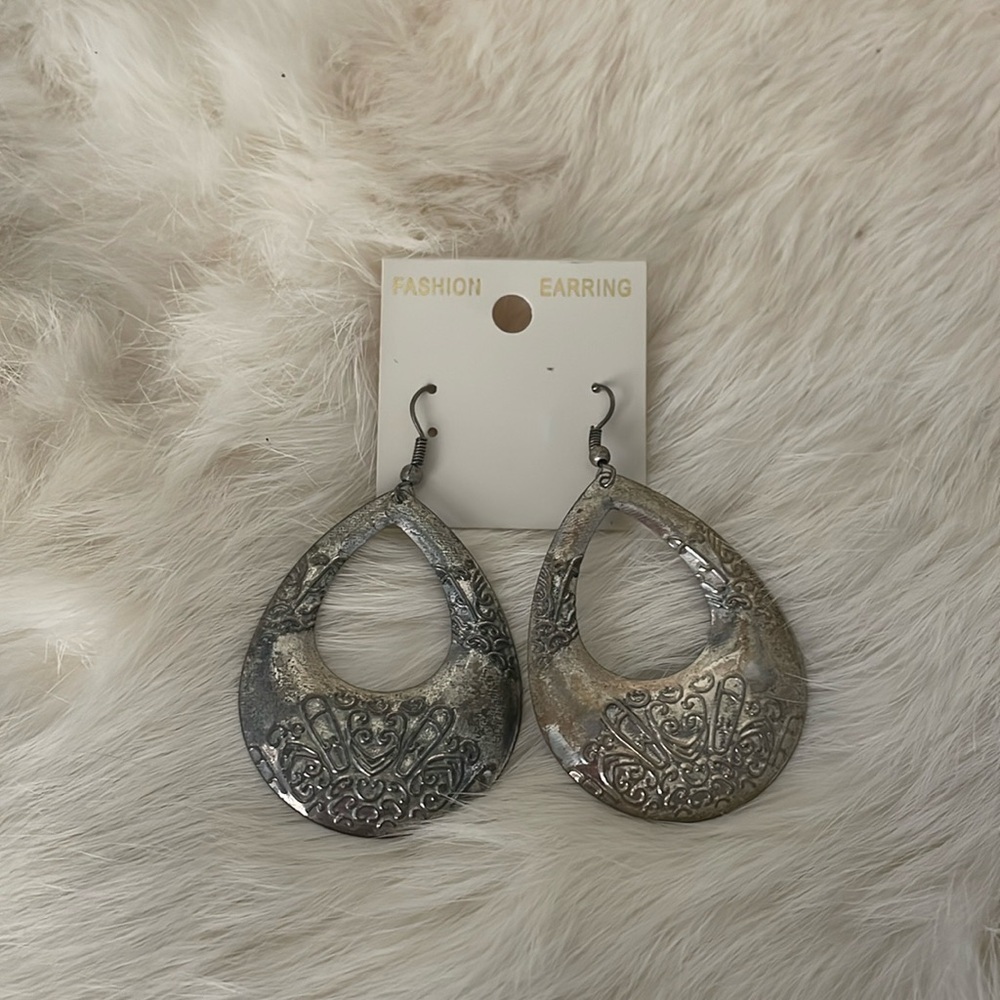 Silver Tone Oval Shaped Textured Pierced Earrings